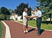 Driveway Impressions design specialist with a customer